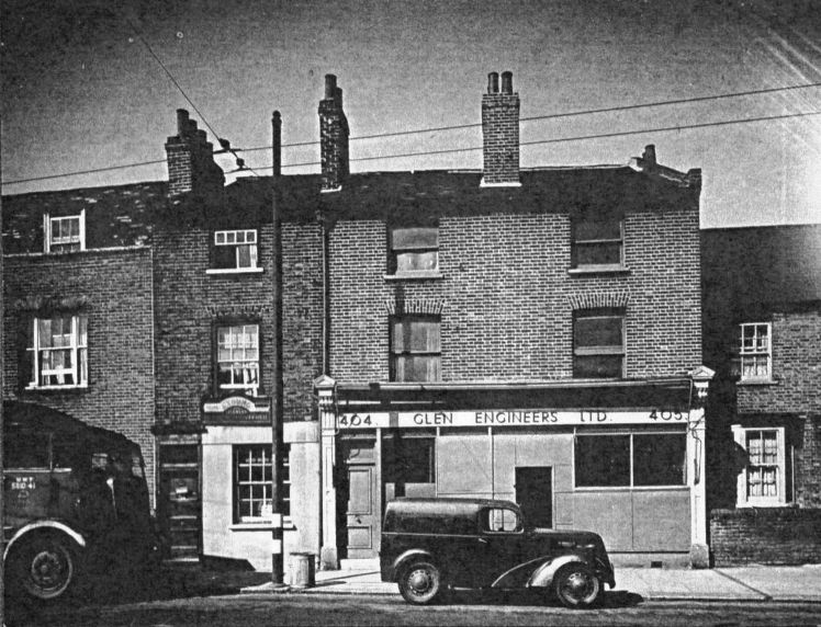 view of 3 storey brick built properties