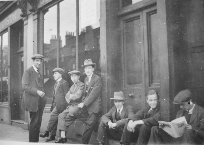 7 men taking a break outside Bohee's