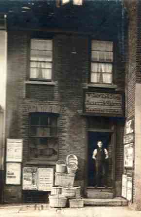 View outside same premises: Arthur John ? Dawes with a range of baskets and a hamper