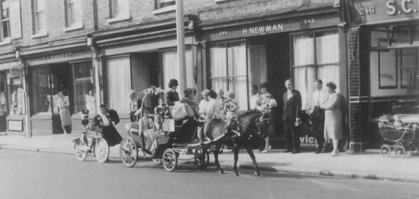 Horse and carriage drawn by two dappled shire horses