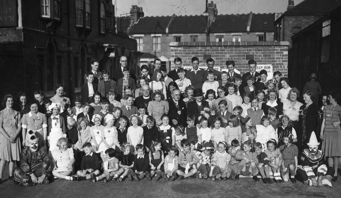 B/W photo of outdoor party