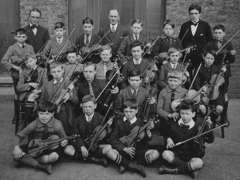 Outdoor photo of a violin class