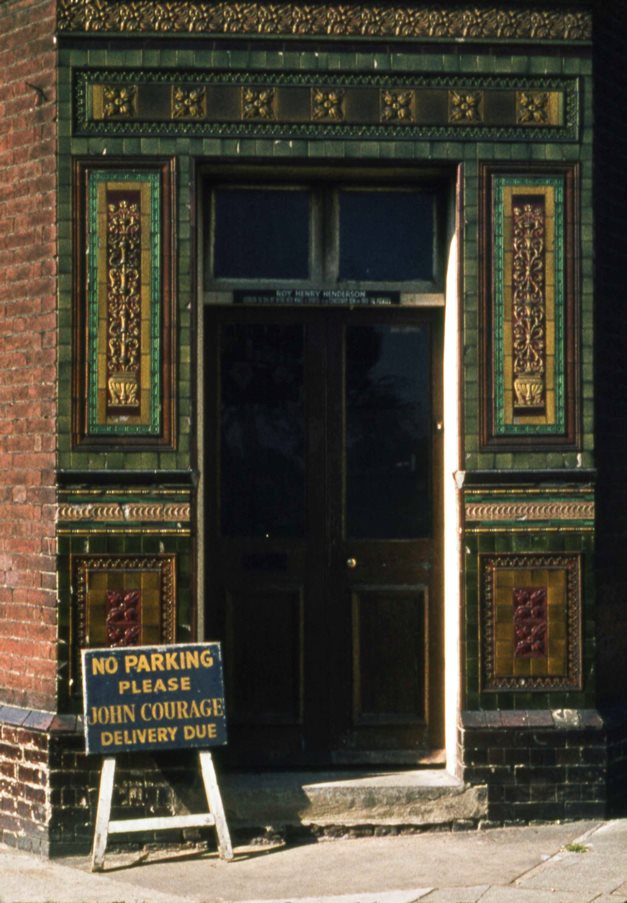 Tiled doorway, predominant colour green