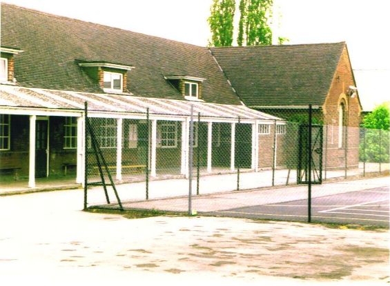 Slate roofed brick building