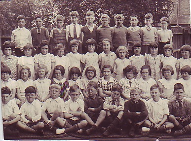 Class photo taken outside